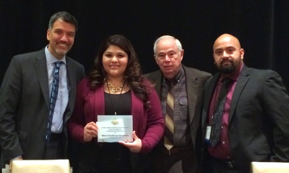 Mitcham Scholarship recipient Maria (center) with NMSHSA Executive Director, Board President and Vice-President. 